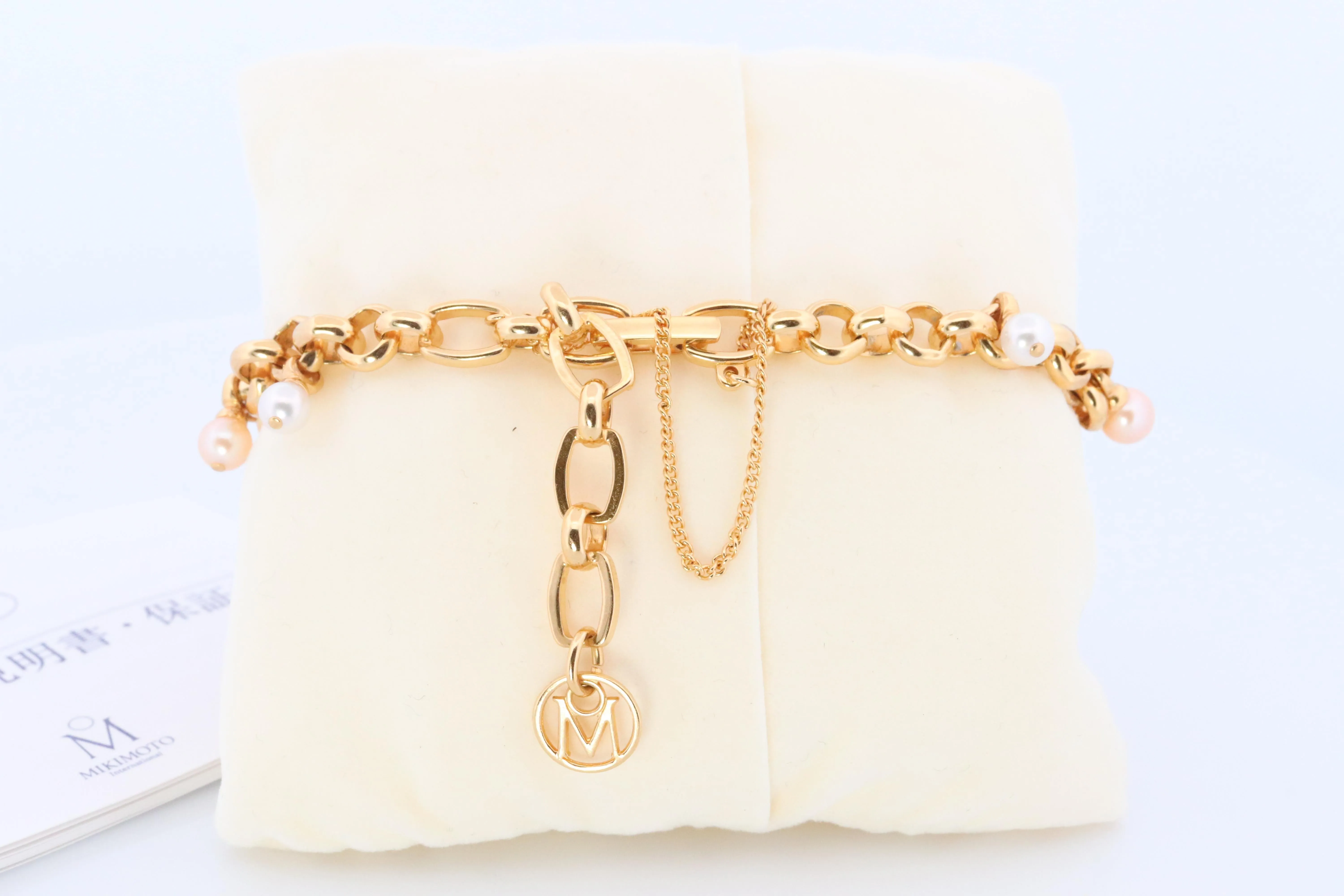 Mikimoto Watch. Mikimoto Pearl Dangle Bracelet Ladies Watch. MOP Dial