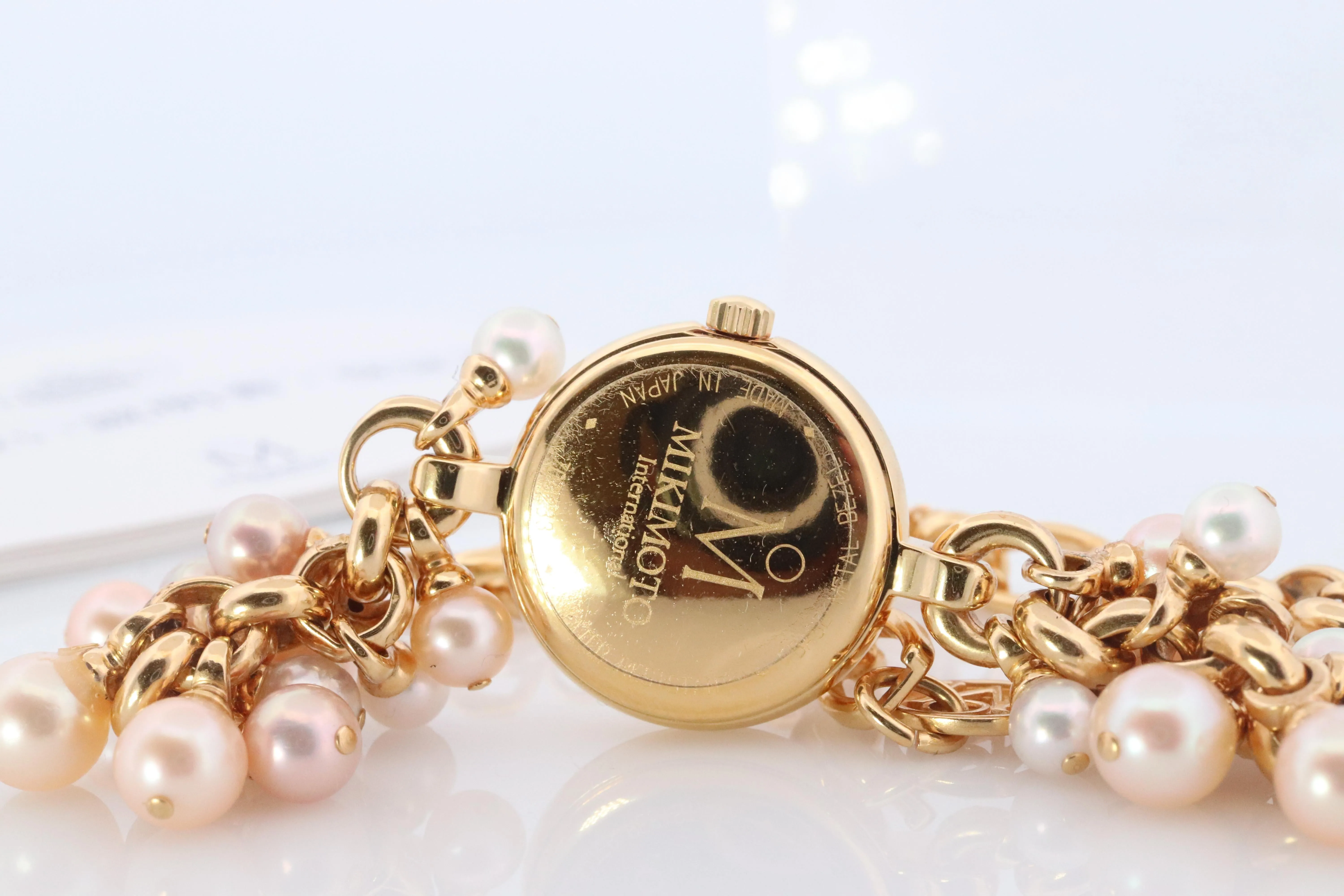 Mikimoto Watch. Mikimoto Pearl Dangle Bracelet Ladies Watch. MOP Dial